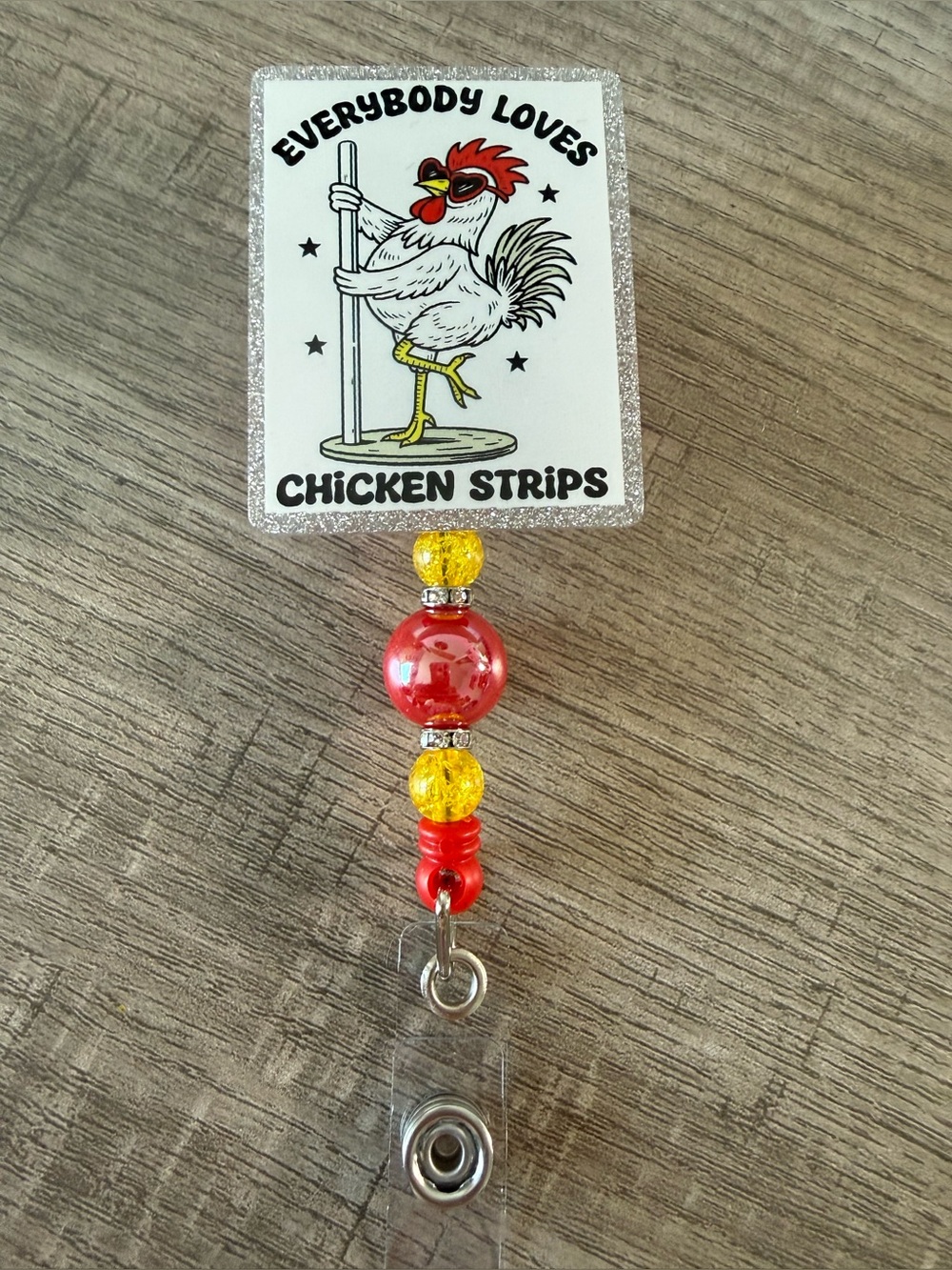 Beaded Chicken Strips Badge Reel with Red & Yellow Accents